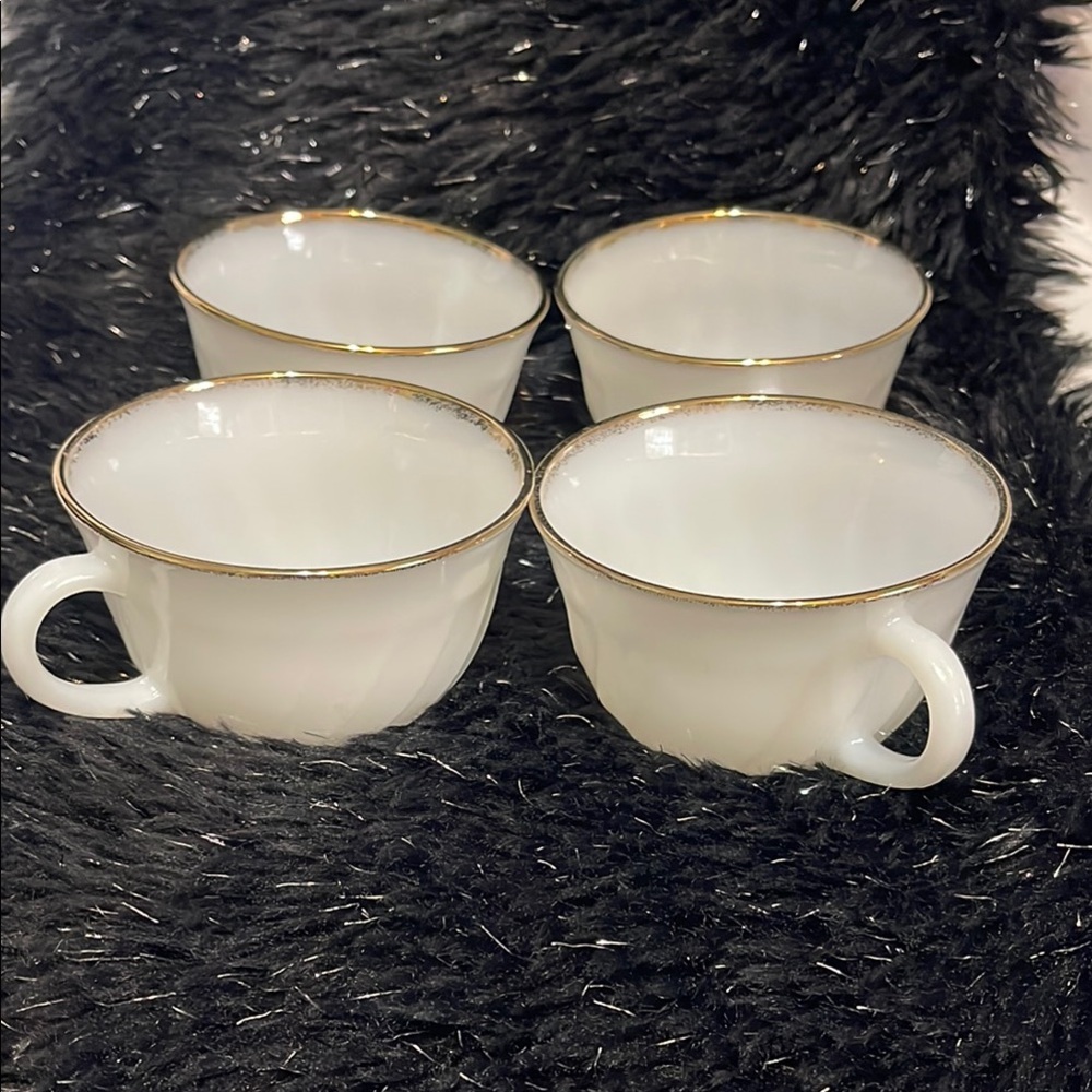 Elegant White Teacups with Gold Trim
